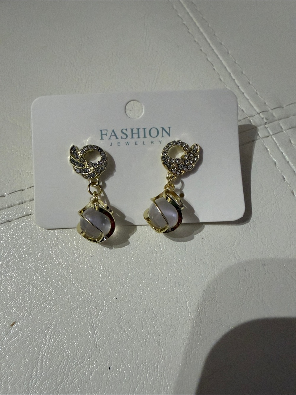 Fashion Jewelry Gold and White Crystal Swirl Drop Earrings